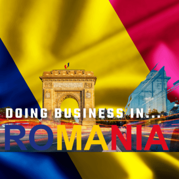 napis Doing Business in Romania na tle rumuńskiej flagi