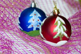 Christmas trees hand decorated, blue and red with Christmas tree motif