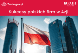 Flaga Polski na tle wieżowców