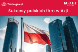 Flaga Polski na tle wieżowców