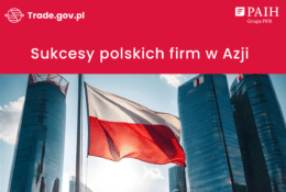 Flaga Polski na tle wieżowców